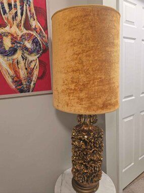 Ornate brass table lamp with gold velvet shade, 1950s style